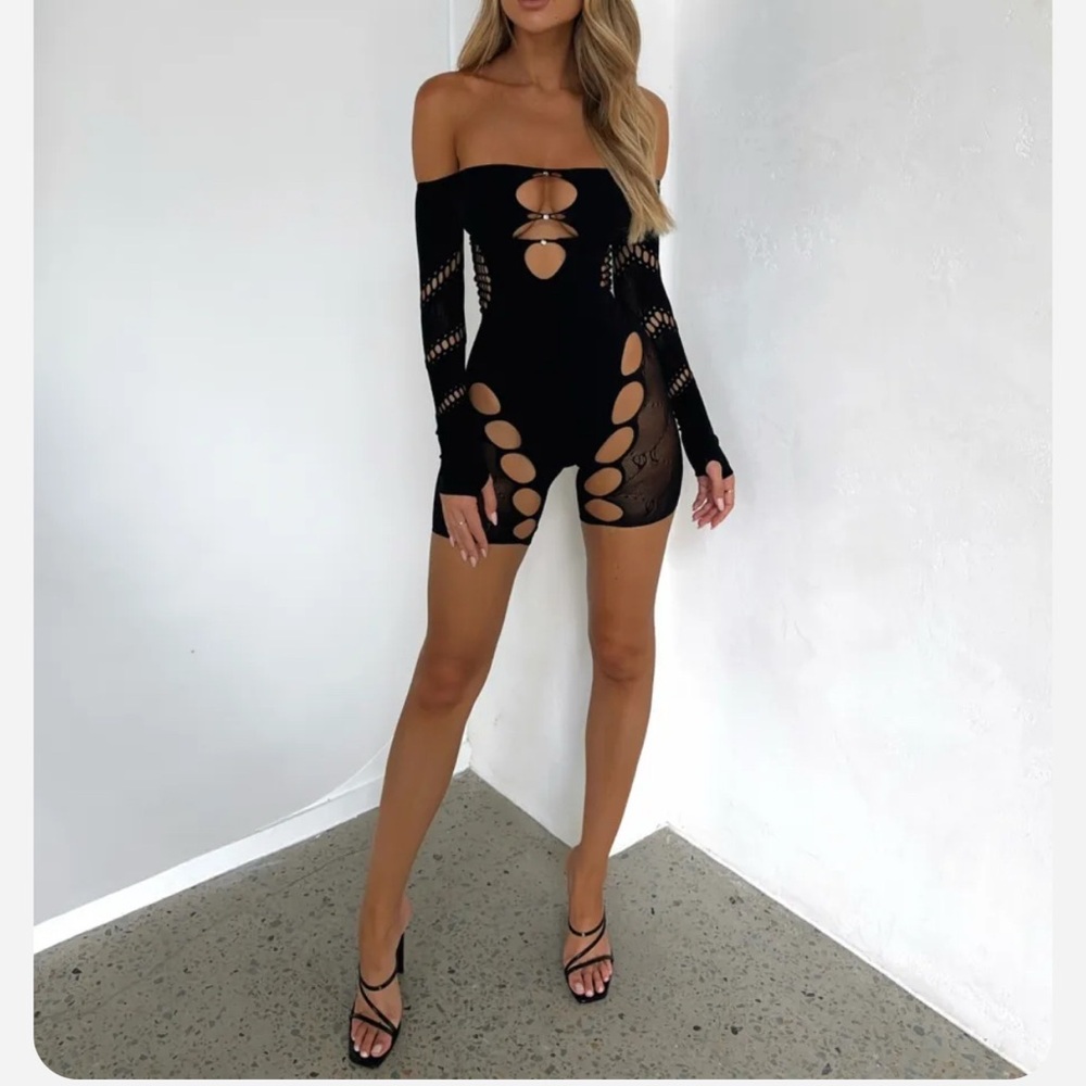 Outcast Company- Main Act Playsuit. NWTs. One size.